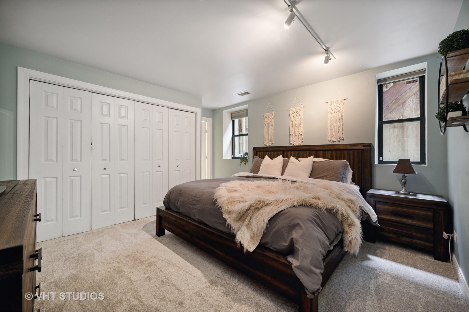 2543 North Racine Avenue, Unit G Chicago, IL 60614 - Photo 7 of 15 a bedroom with a bed and walk in closet