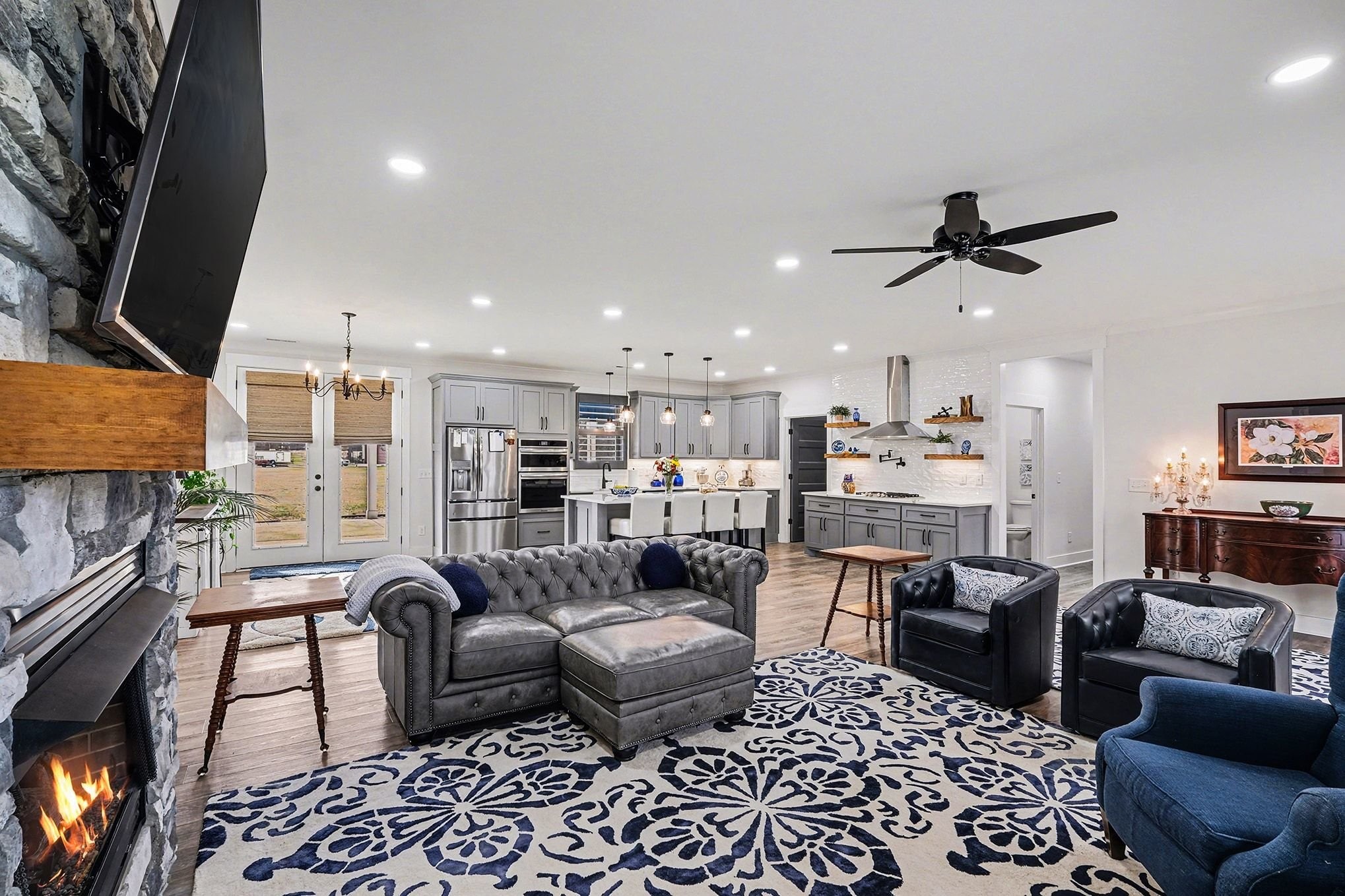 1801 Twin Caves Road Lewisburg, TN 37091 - Photo 13 of 43 a living room with furniture kitchen view and a chandelier