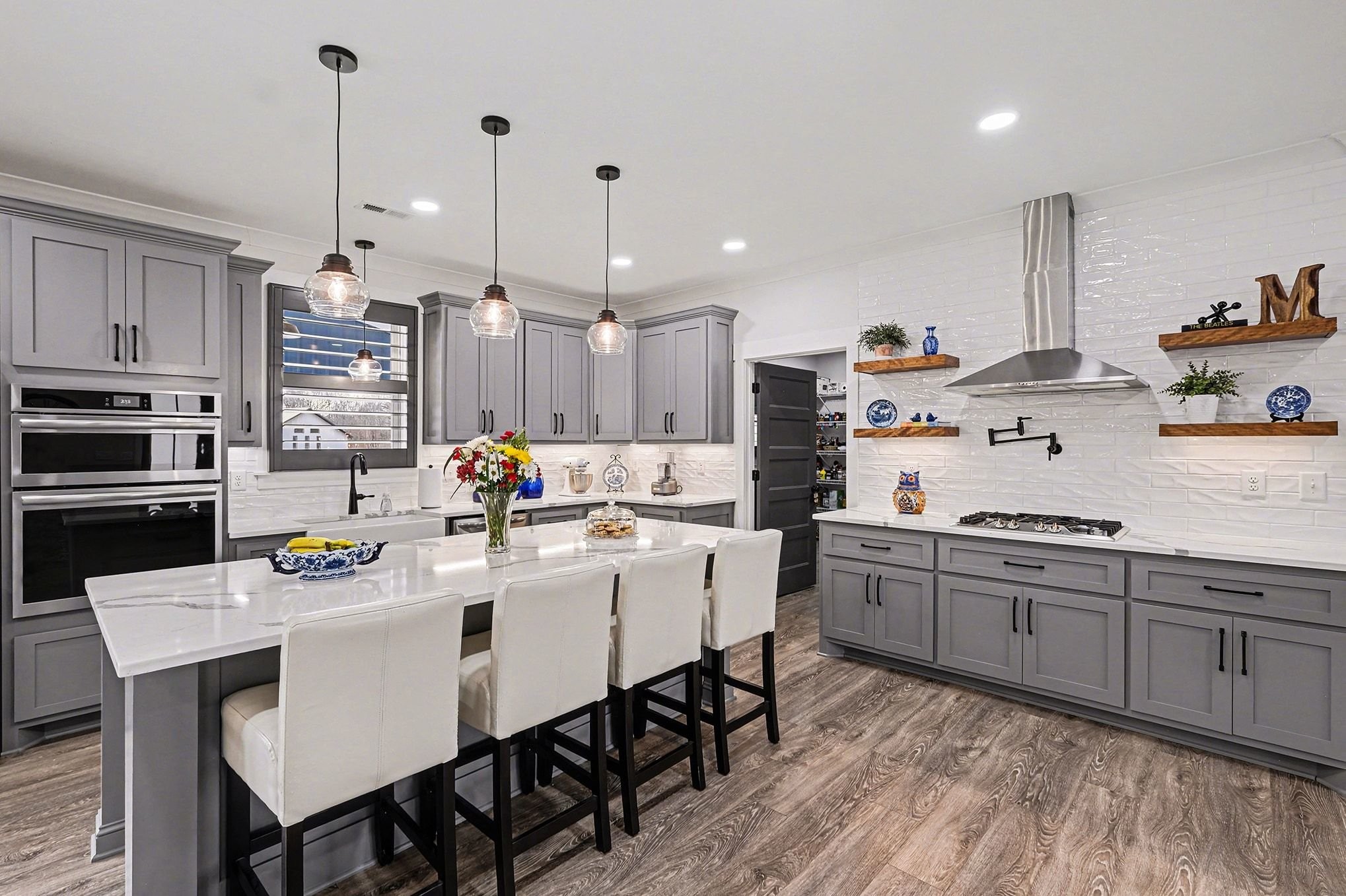 1801 Twin Caves Road Lewisburg, TN 37091 - Photo 14 of 43 a kitchen with kitchen island granite countertop a sink a center island and appliances