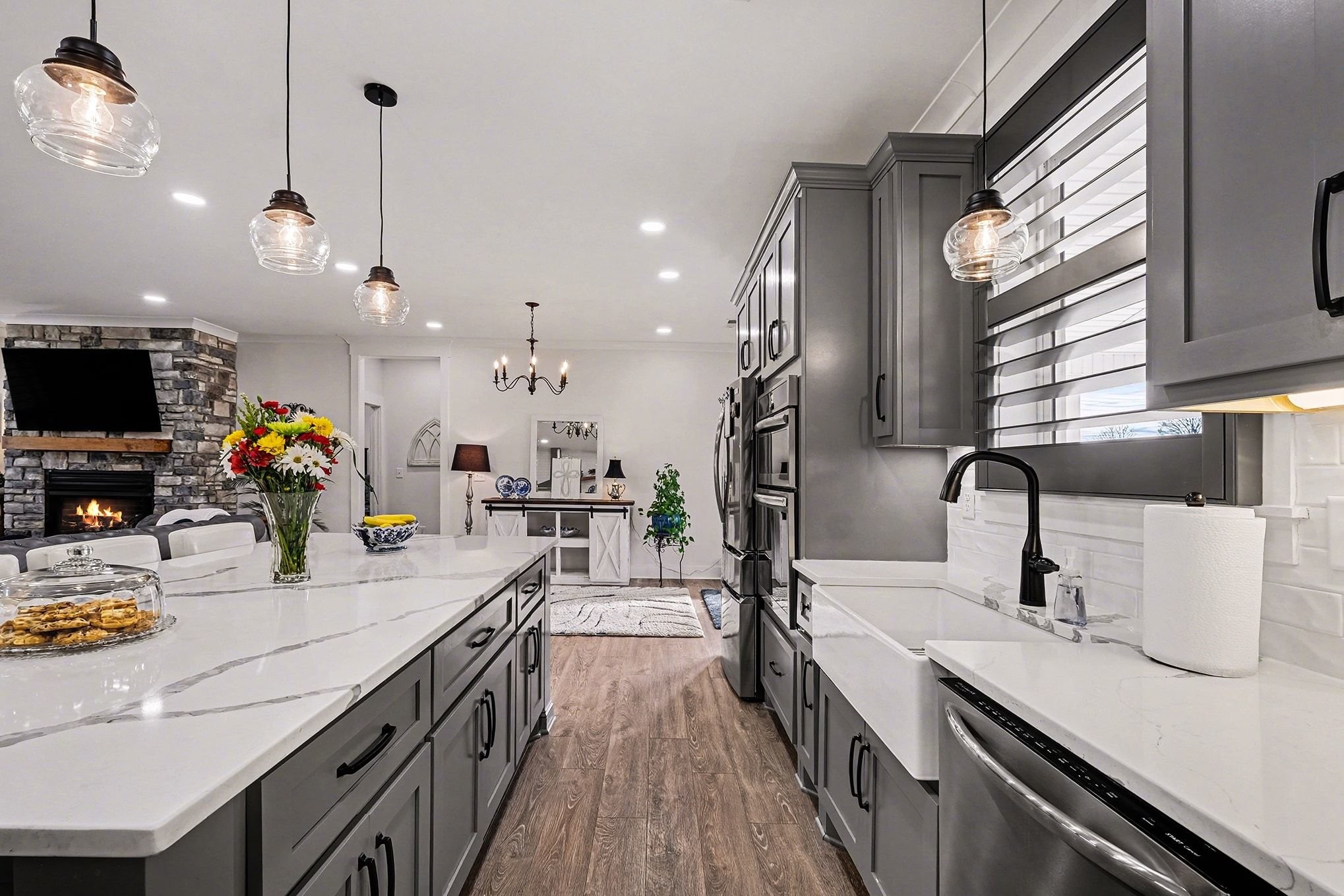 1801 Twin Caves Road Lewisburg, TN 37091 - Photo 17 of 43 a kitchen with sink stove and wooden floor