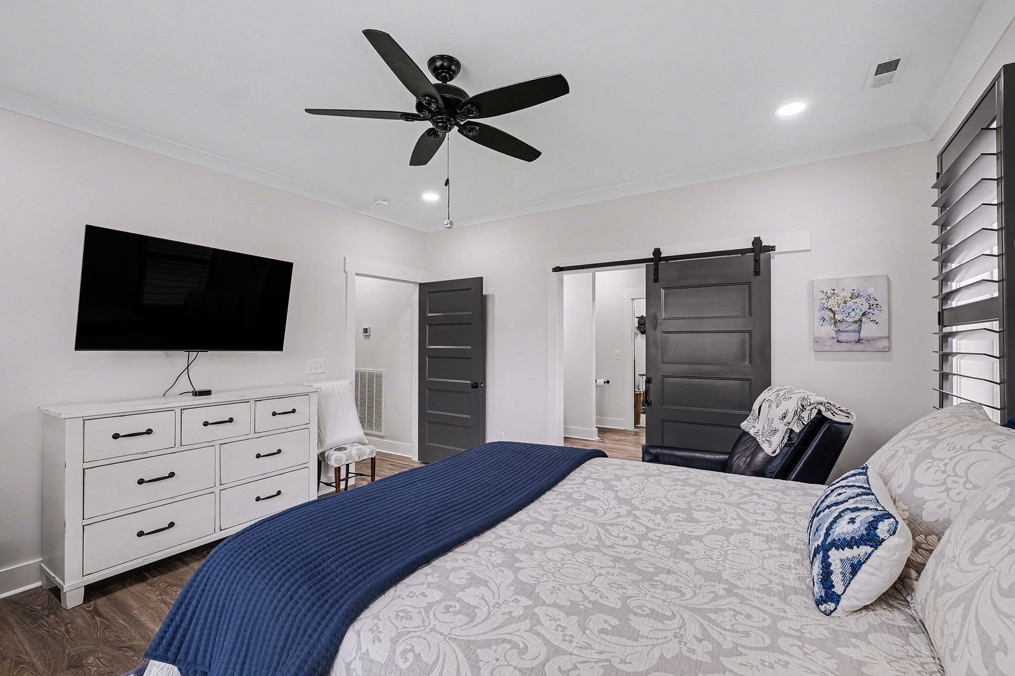 1801 Twin Caves Road Lewisburg, TN 37091 - Photo 23 of 43 a bedroom with a bed and a flat screen tv