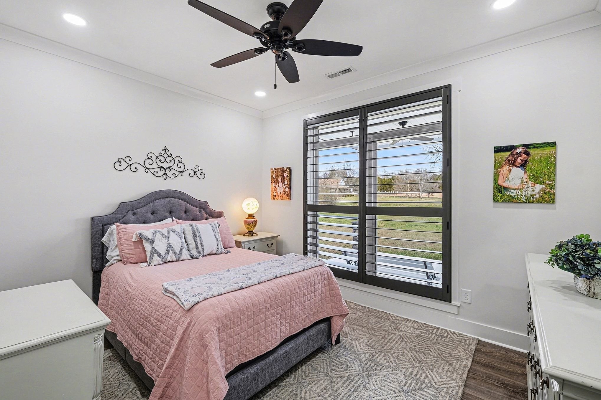 1801 Twin Caves Road Lewisburg, TN 37091 - Photo 27 of 43 a bedroom with a large bed and a chandelier