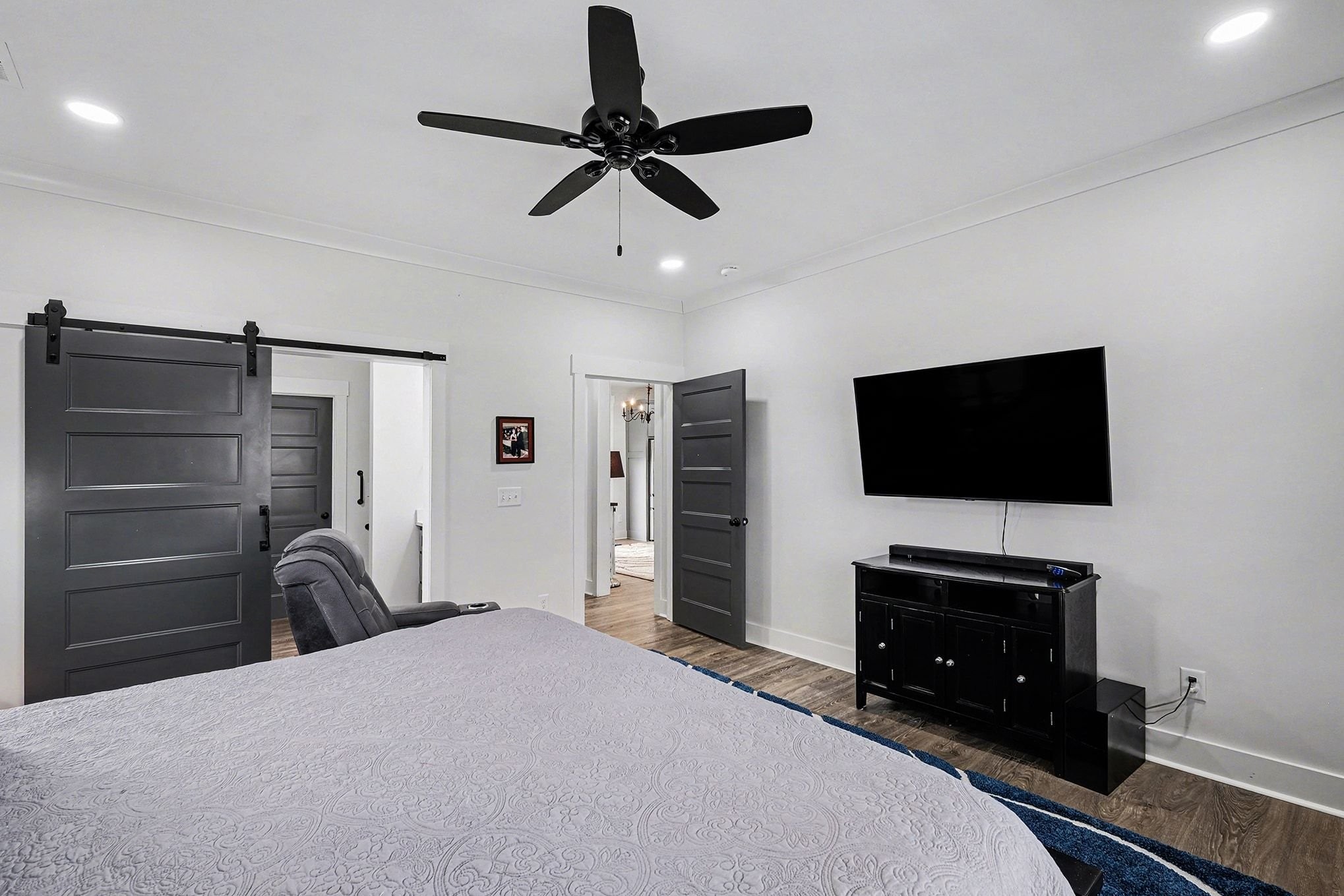 1801 Twin Caves Road Lewisburg, TN 37091 - Photo 29 of 43 a bedroom with a bed and a flat screen tv