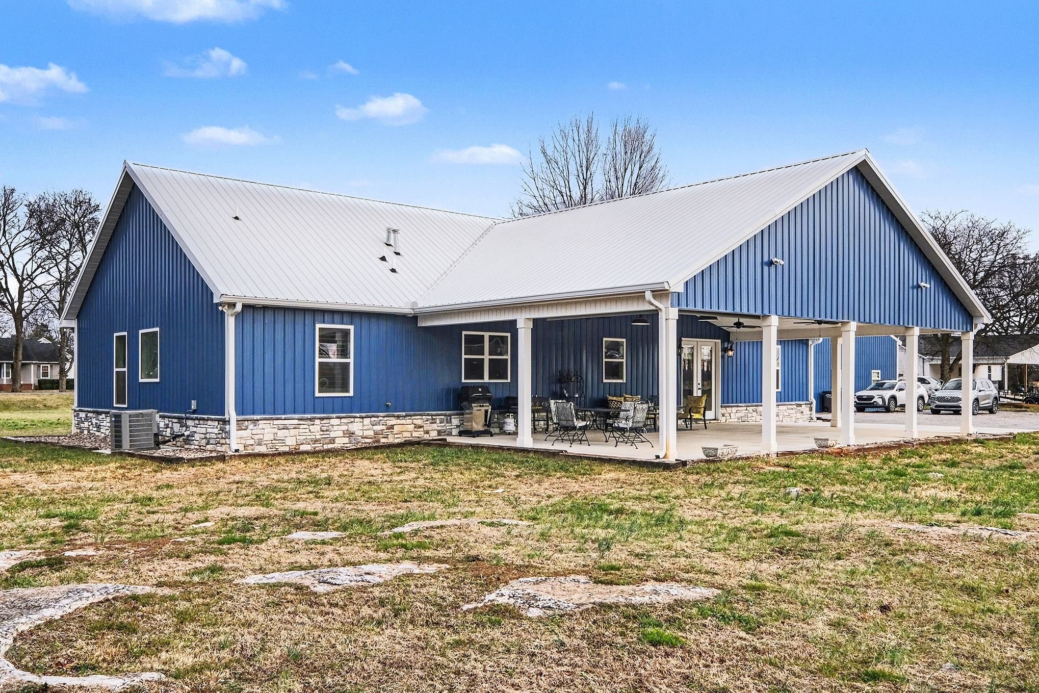 1801 Twin Caves Road Lewisburg, TN 37091 - Photo 40 of 43 a view of a house with a swimming pool with a patio