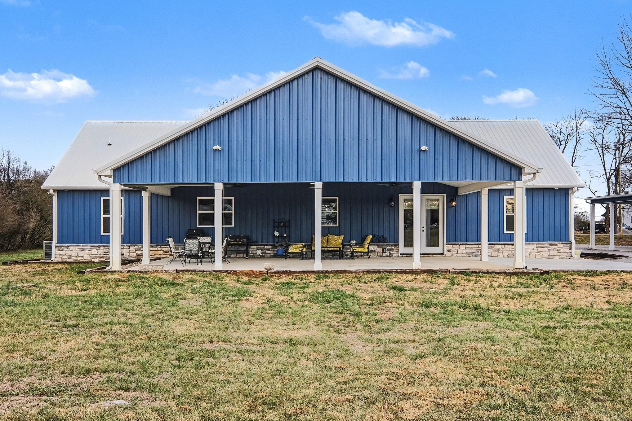 1801 Twin Caves Road Lewisburg, TN 37091 - Photo 41 of 43 a front view of a house with a yard table and chairs