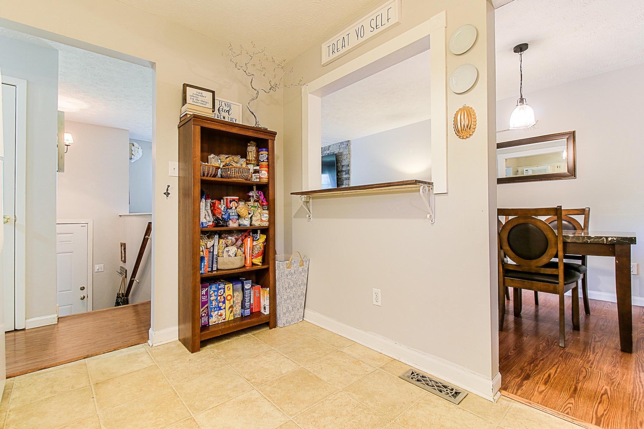 4129 Angola Road Knoxville, TN 37921 - Photo 12 of 28 a view of a hallway with wooden floor and furniture