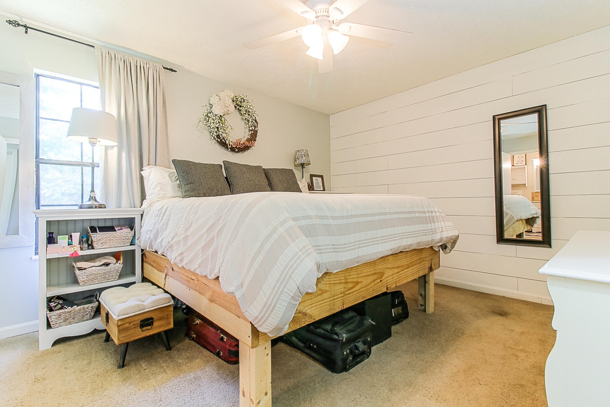 4129 Angola Road Knoxville, TN 37921 - Photo 15 of 28 a bedroom with a bed and a chandelier
