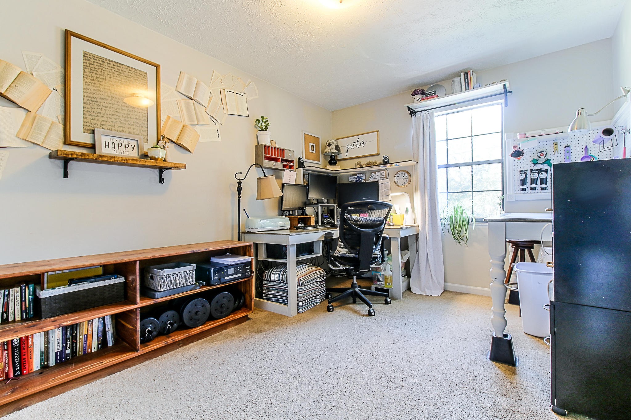 4129 Angola Road Knoxville, TN 37921 - Photo 17 of 28 a view of a workspace with furniture and a bookshelf