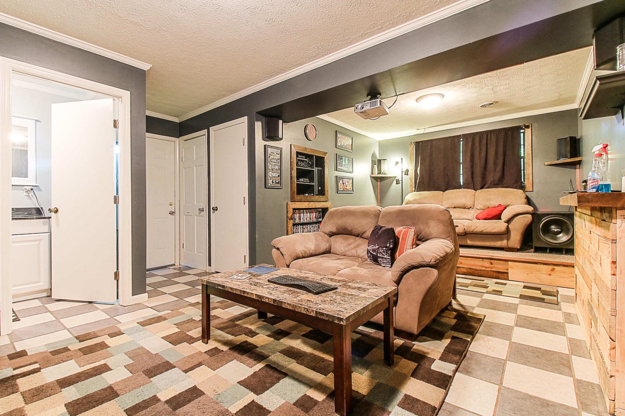4129 Angola Road Knoxville, TN 37921 - Photo 23 of 28 a living room with furniture and a flat screen tv