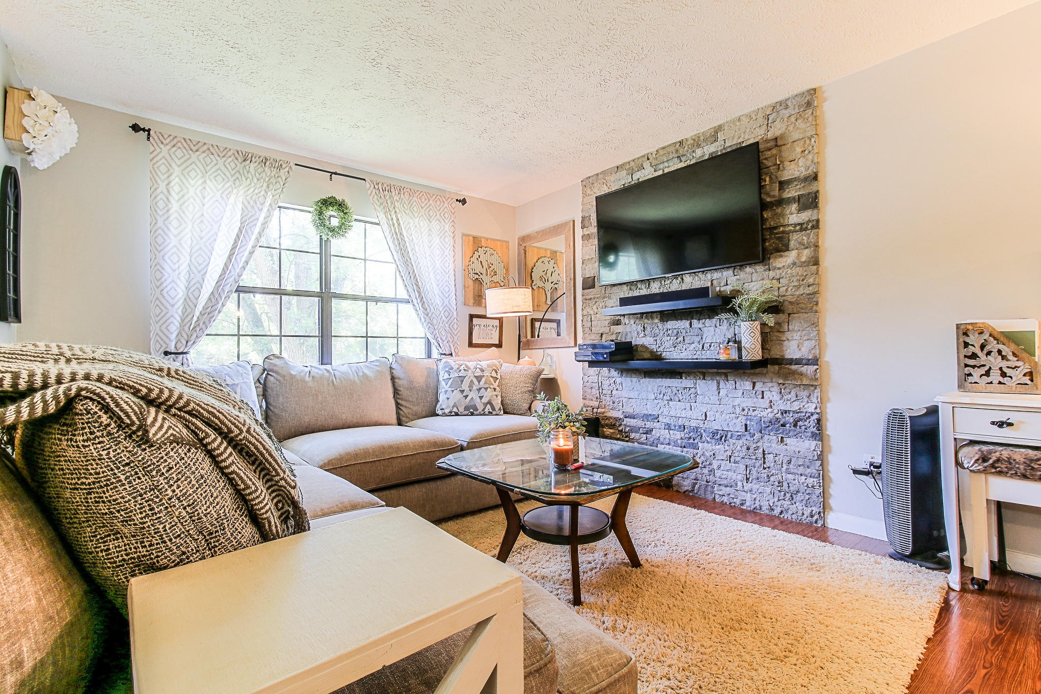 4129 Angola Road Knoxville, TN 37921 - Photo 5 of 28 a living room with furniture and a flat screen tv