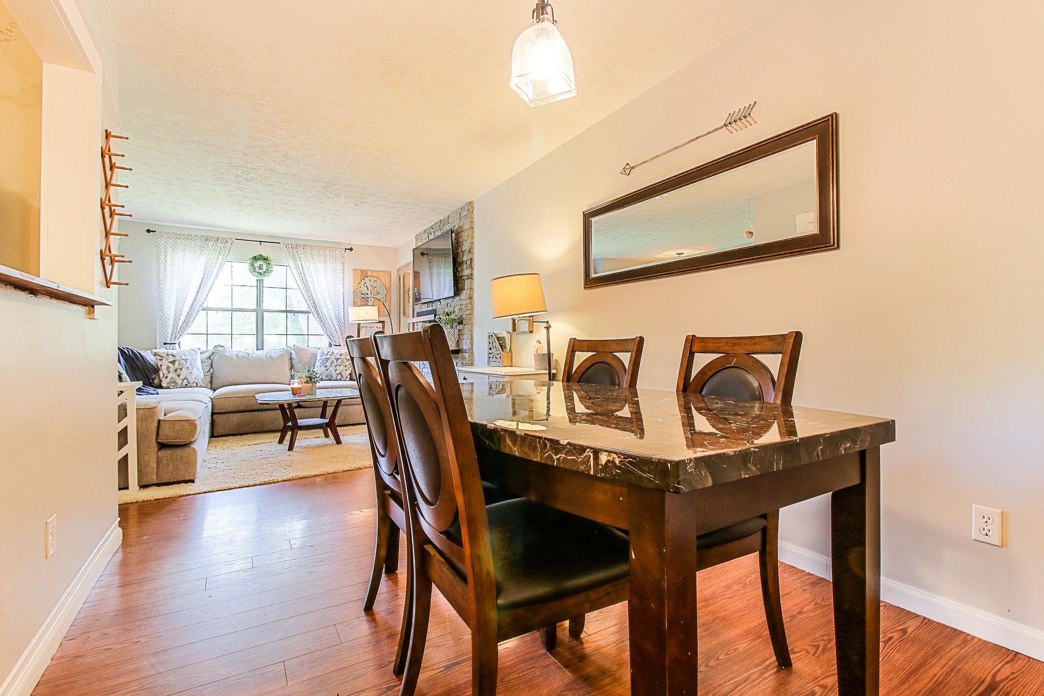 4129 Angola Road Knoxville, TN 37921 - Photo 8 of 28 a view of a dining room with furniture and wooden floor