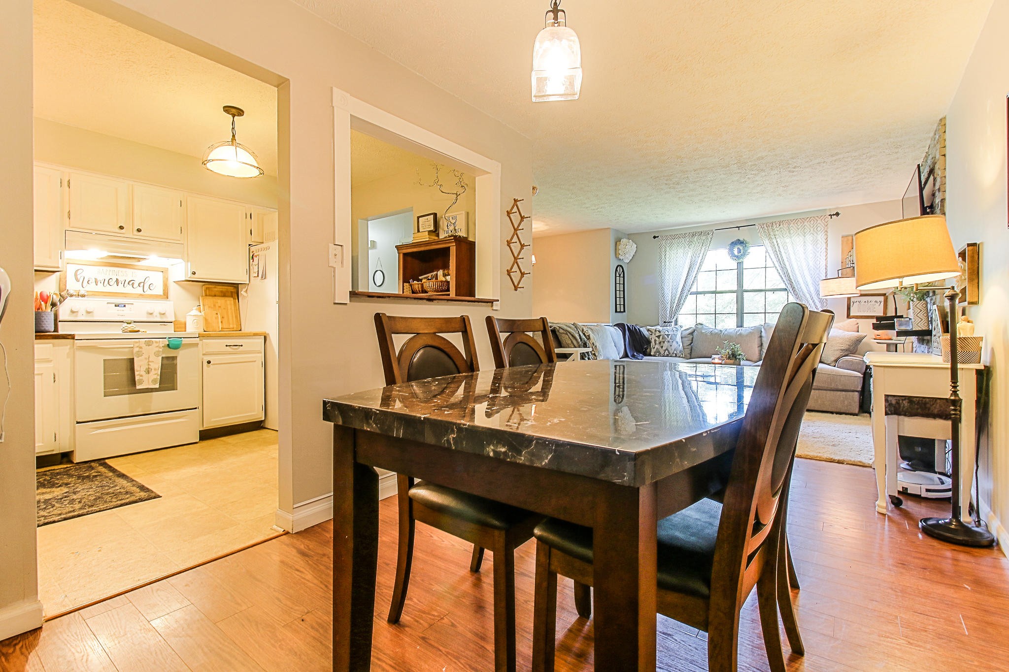 4129 Angola Road Knoxville, TN 37921 - Photo 9 of 28 a view of a dining room with furniture and wooden floor