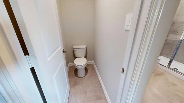 a spacious bathroom with a double vanity sink a mirror and a shower