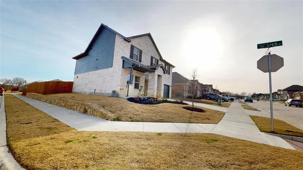 a view of a house with swimming pool