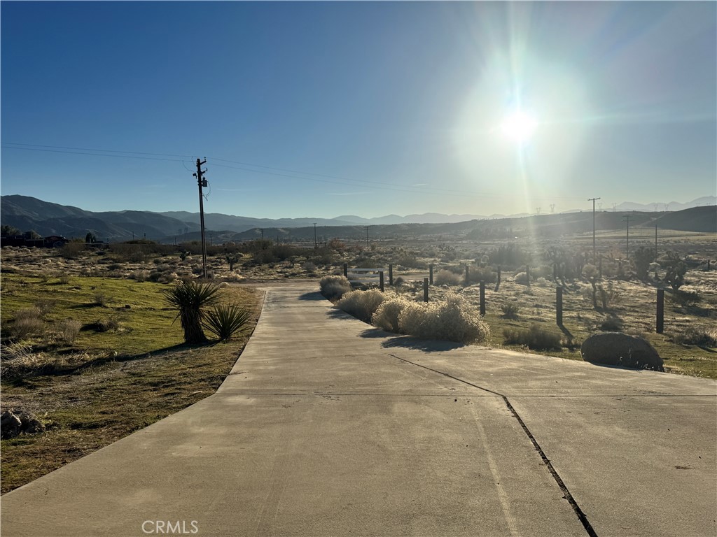 19574 Happy Valley Road Apple Valley, CA 92308 - Photo 19 of 58 a view of a terrace with sky view