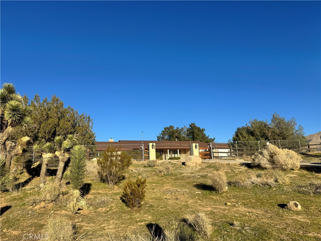 19574 Happy Valley Road Apple Valley, CA 92308 - Photo 2 of 58 a view of residential houses with outdoor space
