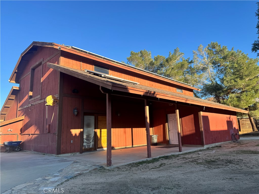19574 Happy Valley Road Apple Valley, CA 92308 - Photo 10 of 58 a view of a house with a street