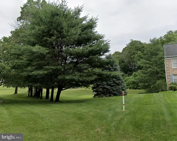 a view of building with trees