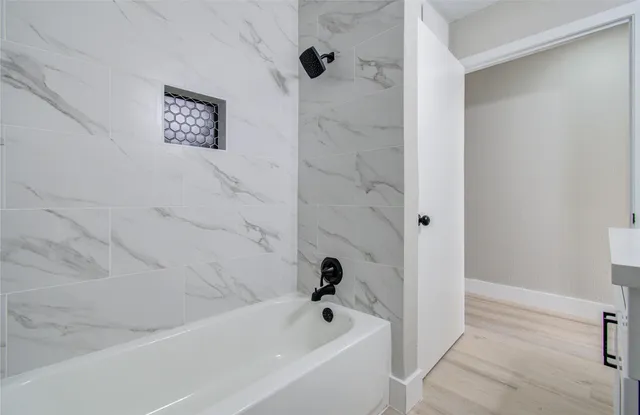 a bathroom with a bathtub