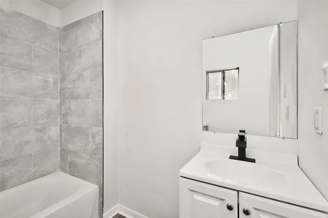 a bathroom with a bathtub