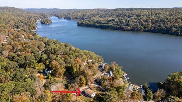 an aerial view of a house with a garden