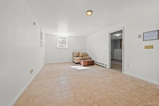 a room with a bed and a window