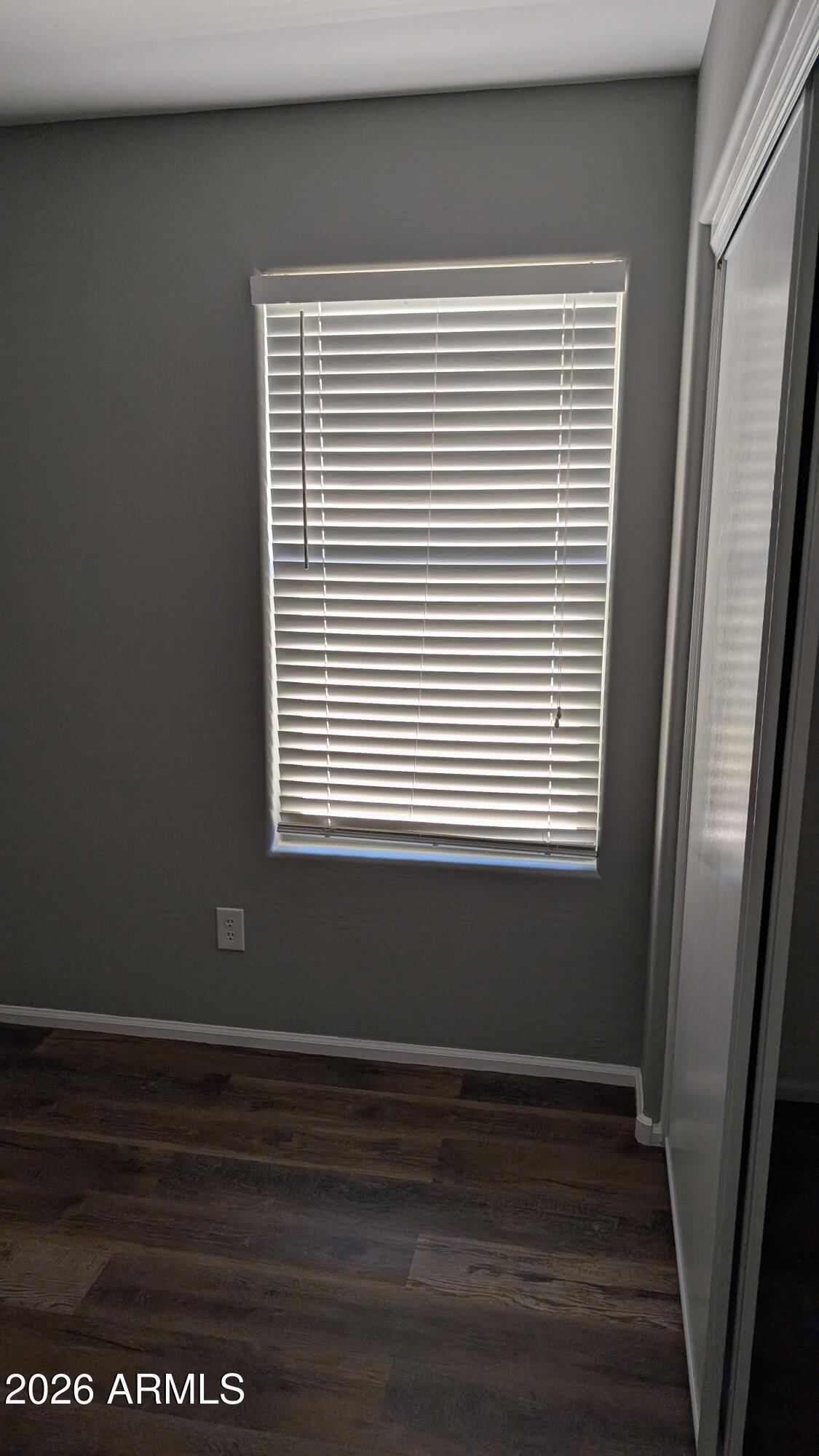1377 East Pryor Road San Tan Valley, AZ 85140 - Photo 26 of 31 a view of a small space with wooden floor and a window