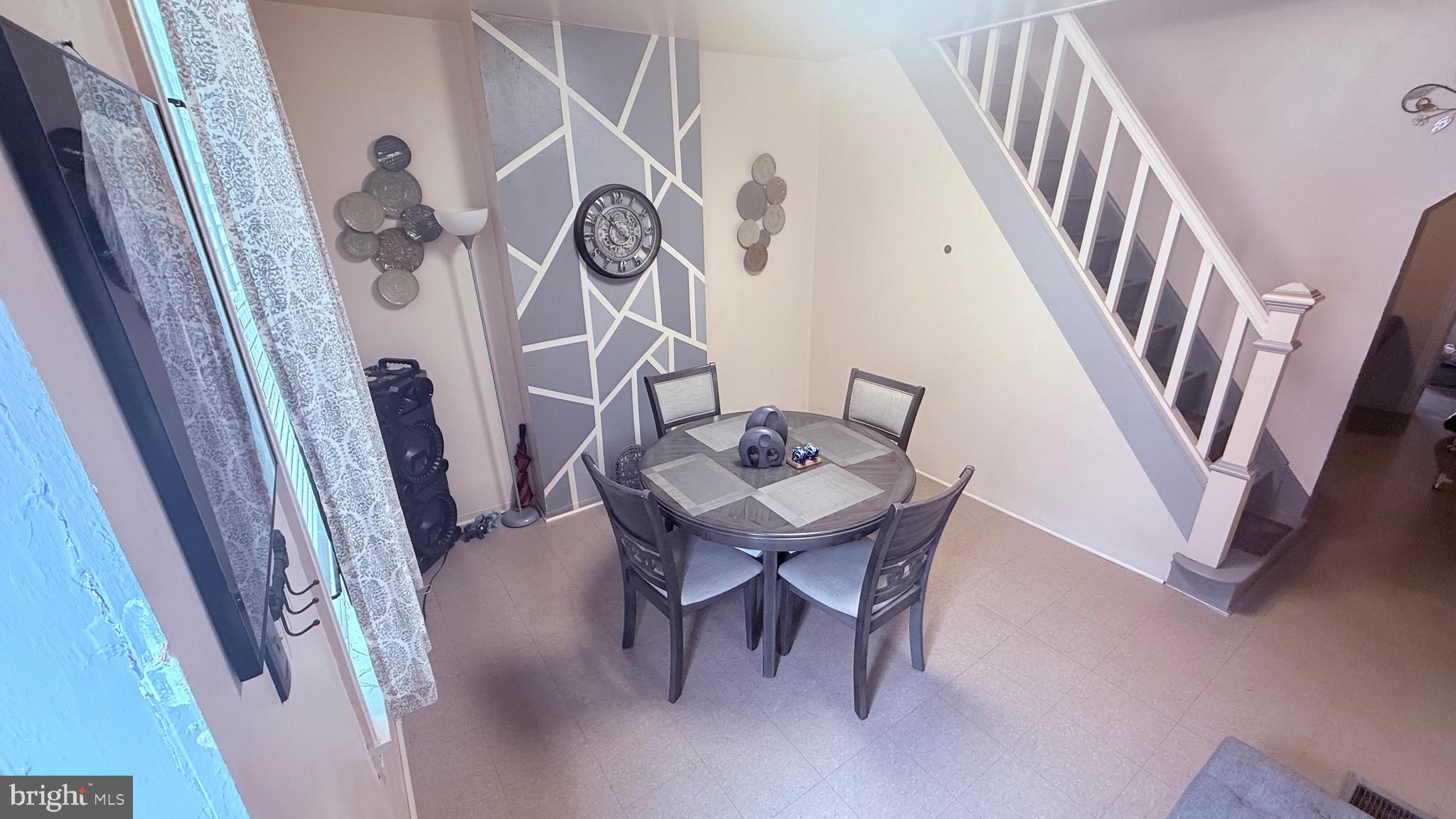 2848 North Lee Street Philadelphia, PA 19134 - Photo 2 of 26 a view of a hallway with furniture and stairs
