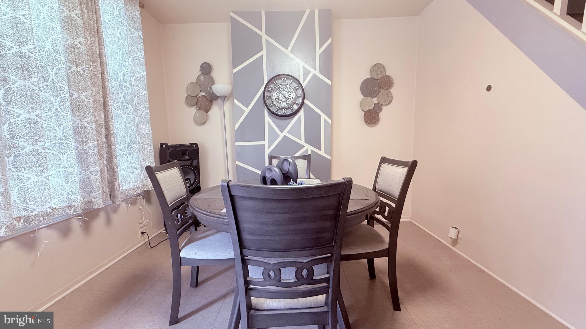2848 North Lee Street Philadelphia, PA 19134 - Photo 4 of 26 a view of a dining room with furniture and a chandelier