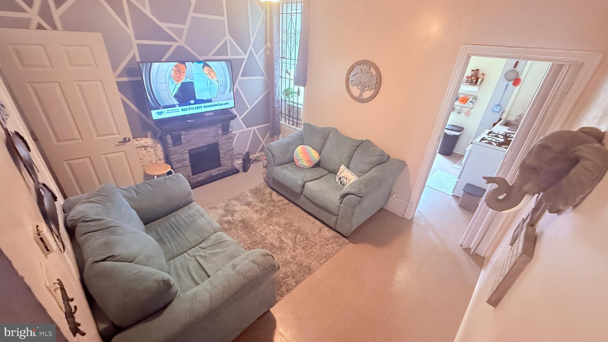 2848 North Lee Street Philadelphia, PA 19134 - Photo 5 of 26 a living room with furniture and a couch