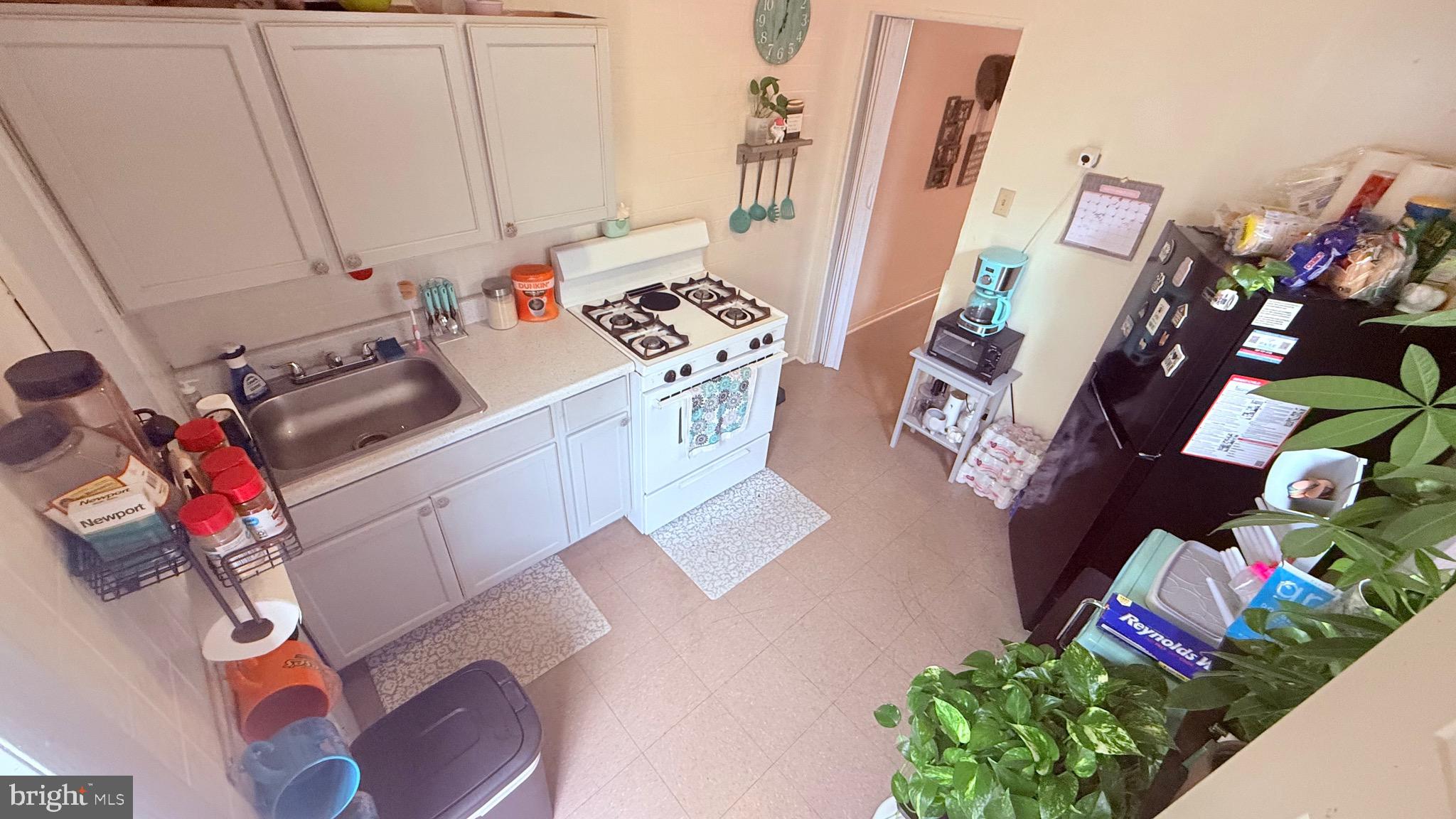 2848 North Lee Street Philadelphia, PA 19134 - Photo 9 of 26 a living room with furniture and toys