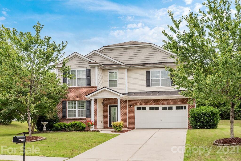 305 Allspice Road Fort Mill, SC 29708 - Photo 1 of 31 a front view of a house with a yard