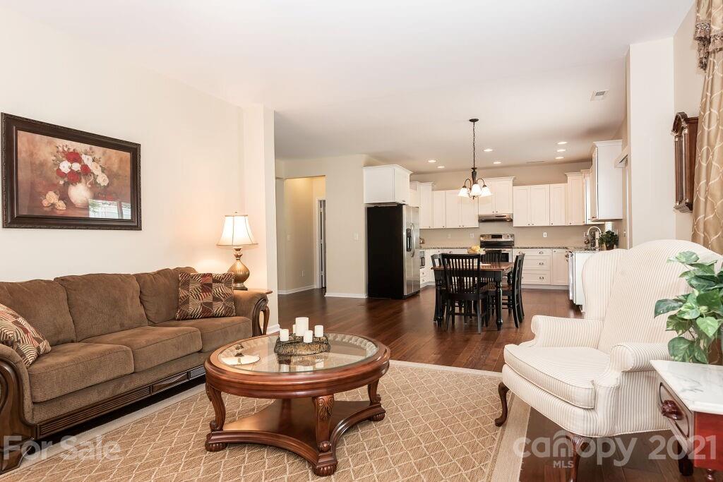 305 Allspice Road Fort Mill, SC 29708 - Photo 14 of 31 a living room with furniture and kitchen view