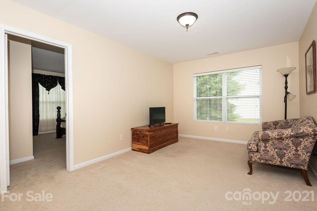 305 Allspice Road Fort Mill, SC 29708 - Photo 22 of 31 a living room with furniture and a window