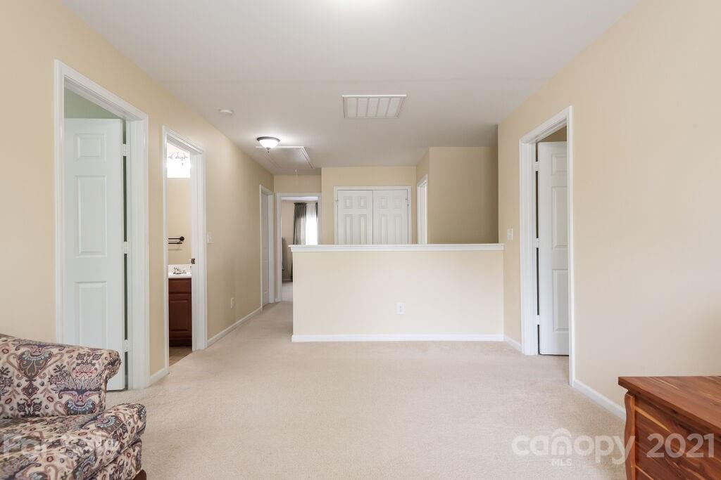 305 Allspice Road Fort Mill, SC 29708 - Photo 23 of 31 a view of livingroom and bedroom with furniture
