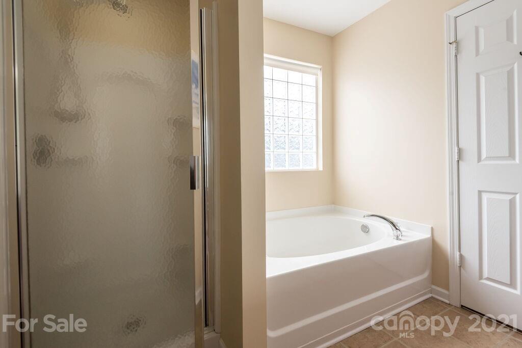 305 Allspice Road Fort Mill, SC 29708 - Photo 27 of 31 a white bath tub sitting next to a window