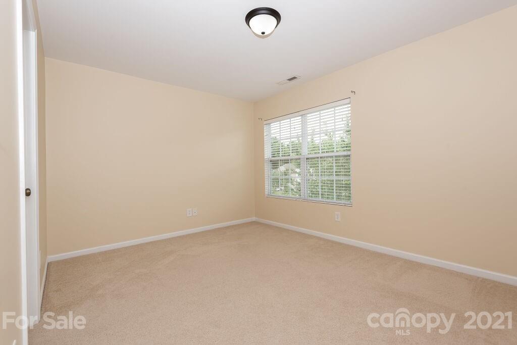 305 Allspice Road Fort Mill, SC 29708 - Photo 28 of 31 an empty room with windows