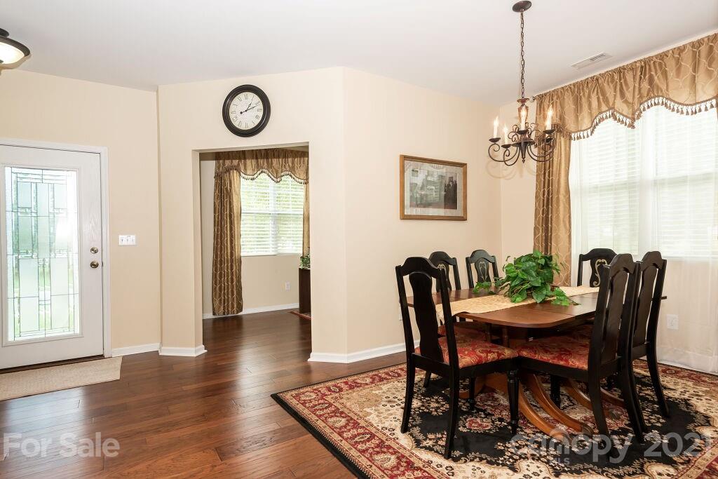 305 Allspice Road Fort Mill, SC 29708 - Photo 9 of 31 a dining room with furniture and window