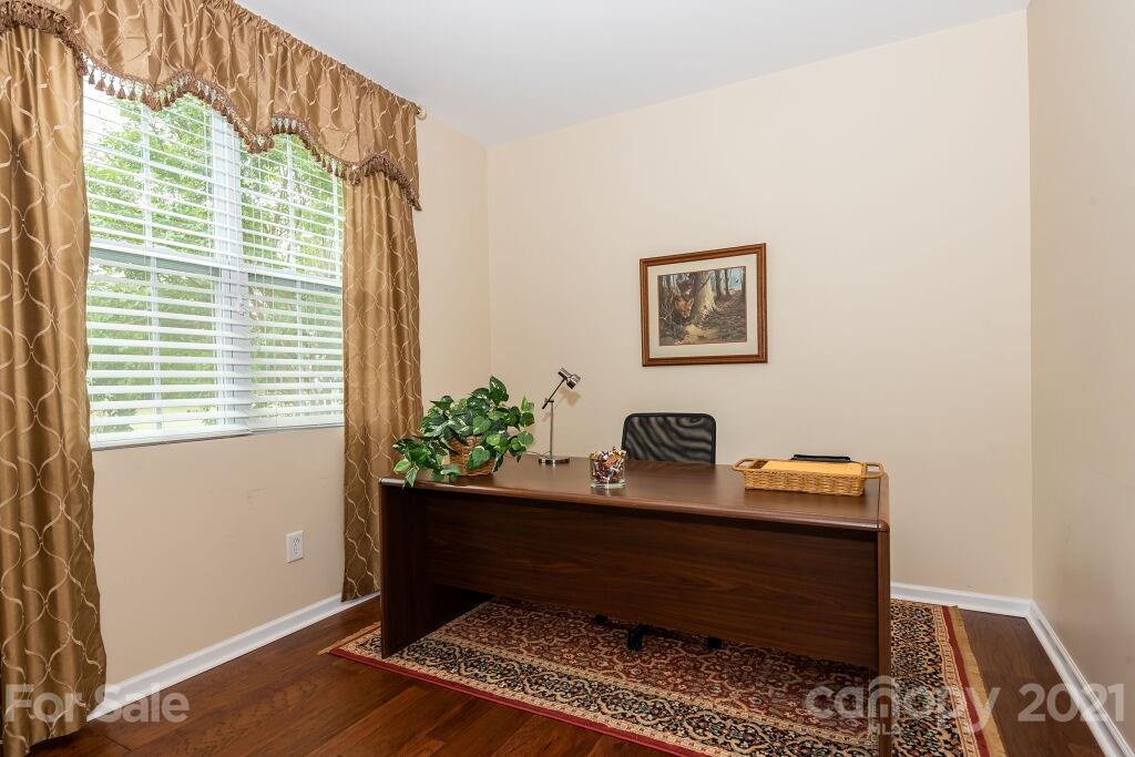 305 Allspice Road Fort Mill, SC 29708 - Photo 10 of 31 a room with painting on the wall and a window