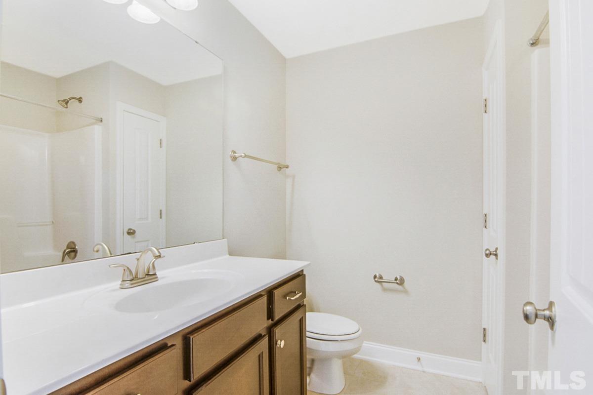 35 Waterpine Drive Garner, NC 27529 - Photo 12 of 25 a bathroom with a sink toilet and shower