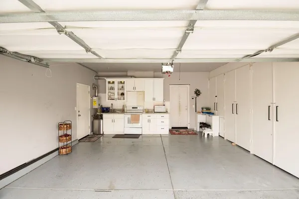 a view of kitchen with furniture and a window