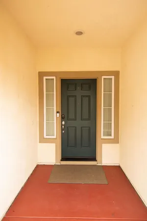 a view of empty room with windows