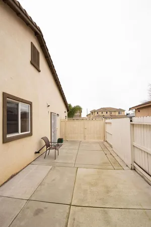 a view of a terrace with chairs