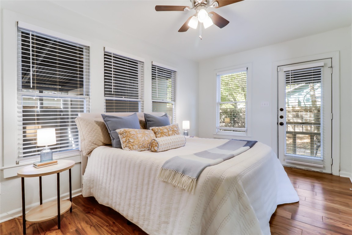 1105 West 43rd Street Austin, TX 78756 - Photo 10 of 22 a bedroom with a large bed and a large window