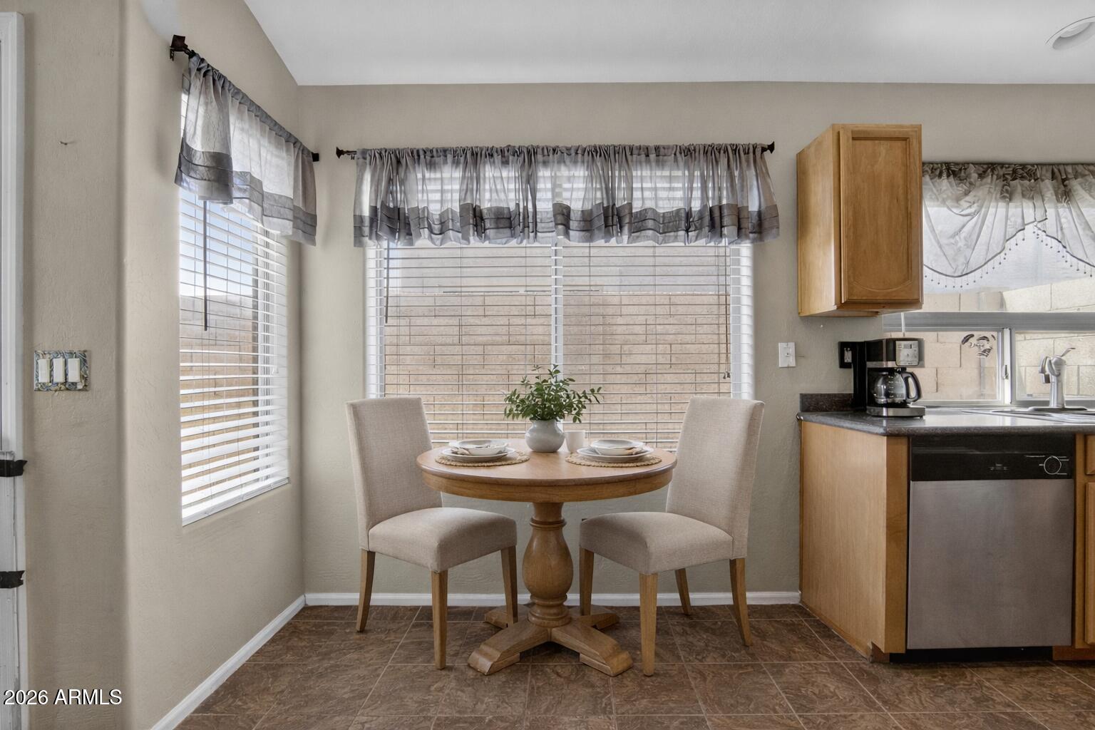 515 West Love Road San Tan Valley, AZ 85143 - Photo 12 of 74 a dining room with furniture and window