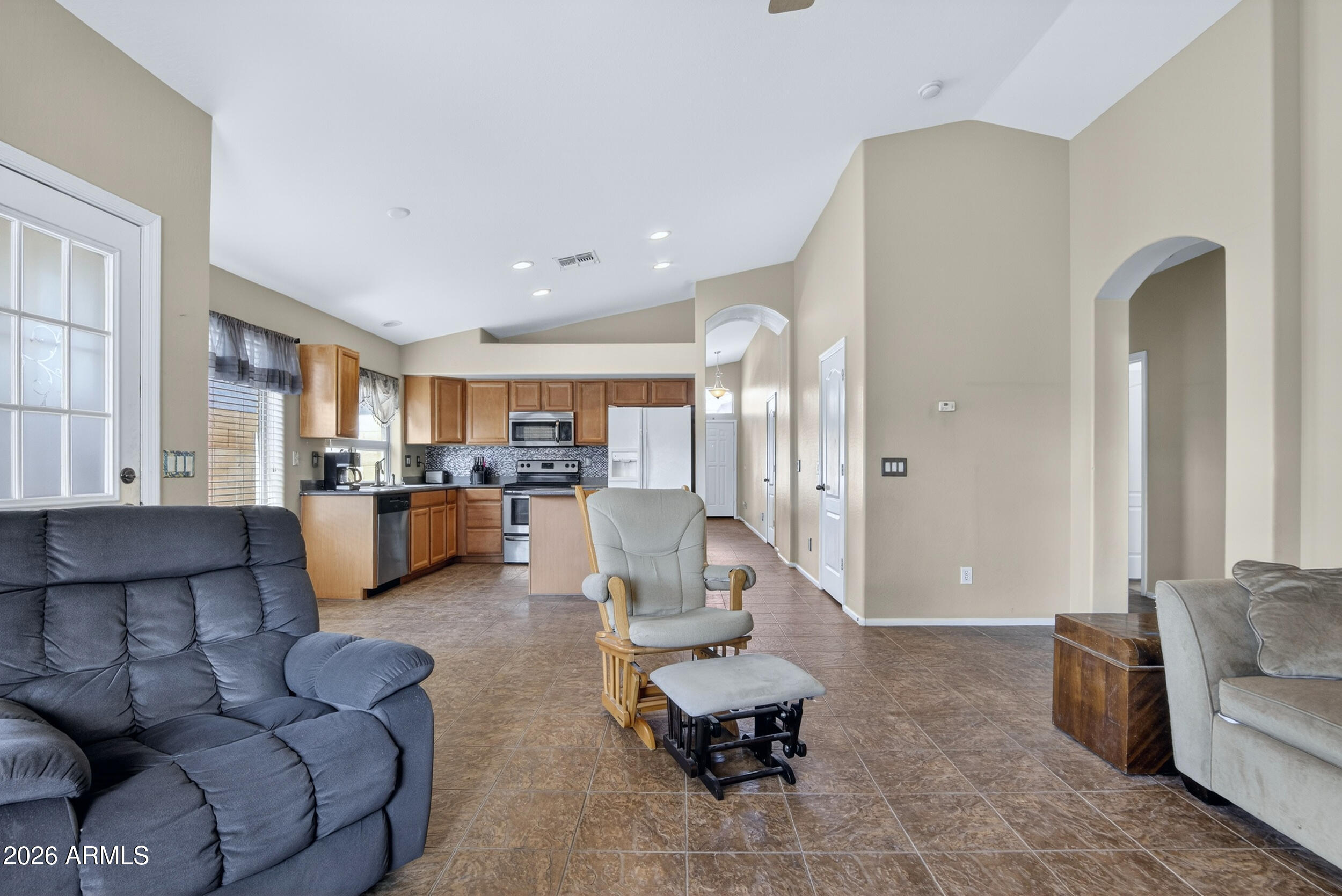 515 West Love Road San Tan Valley, AZ 85143 - Photo 17 of 74 a living room with furniture and kitchen view