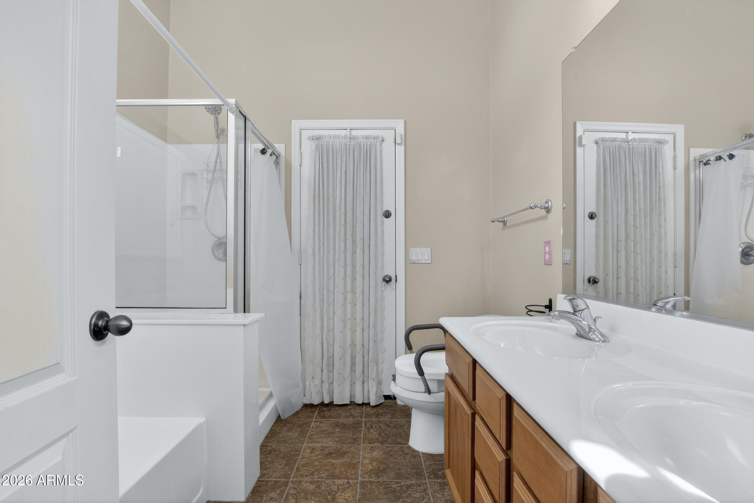 515 West Love Road San Tan Valley, AZ 85143 - Photo 20 of 74 a bathroom with a sink and a mirror