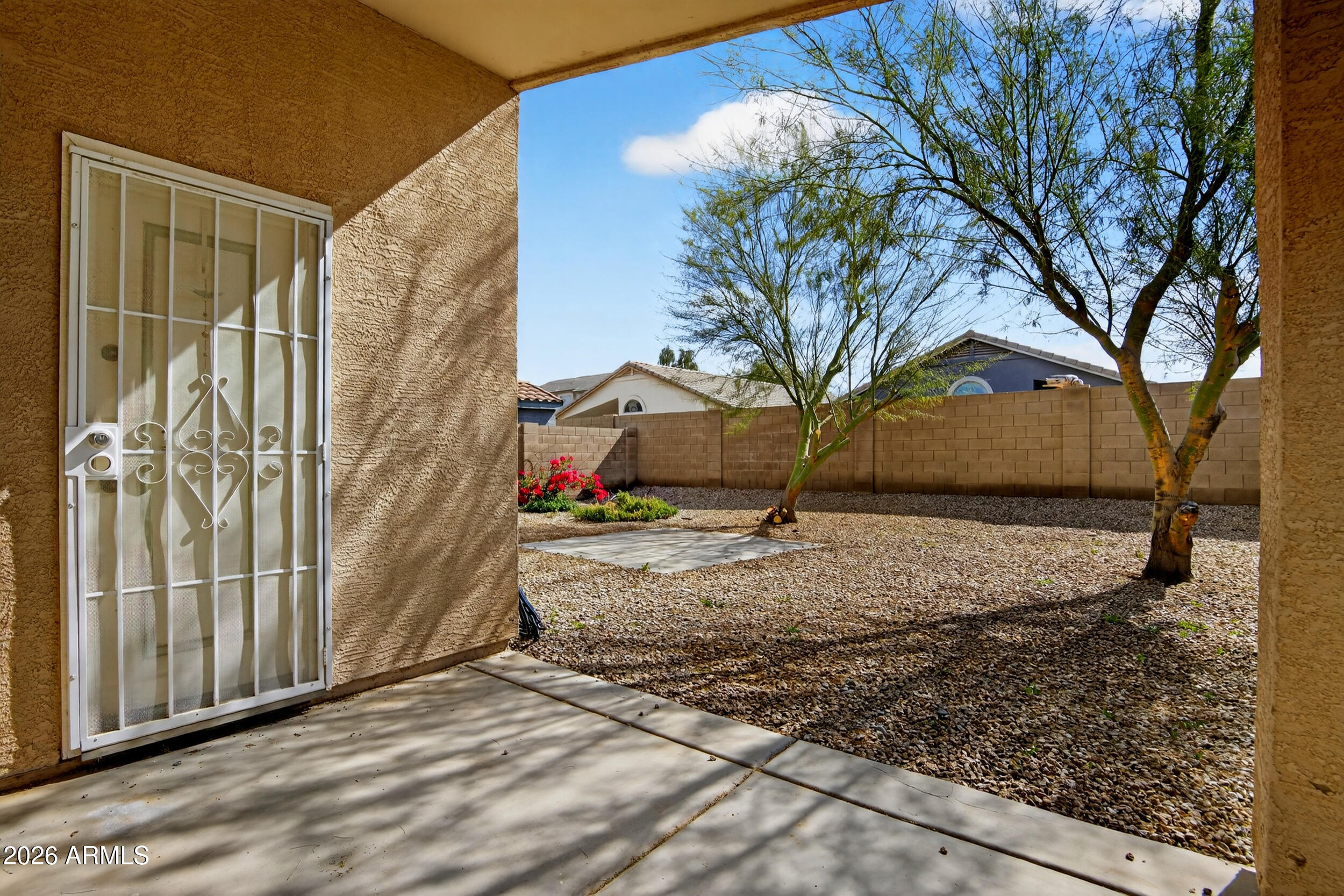 515 West Love Road San Tan Valley, AZ 85143 - Photo 26 of 74 a view of a yard with a tree