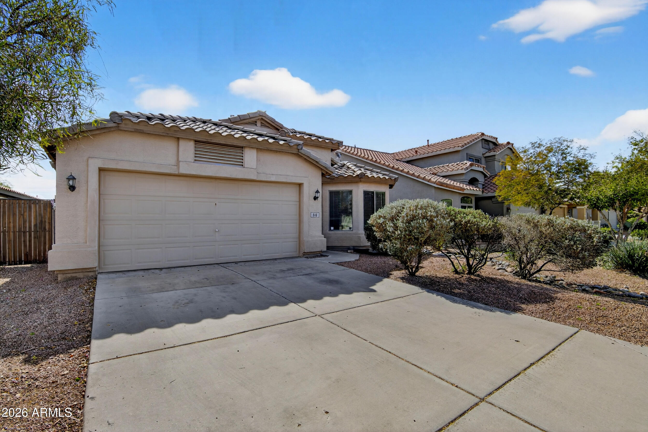 515 West Love Road San Tan Valley, AZ 85143 - Photo 2 of 74 a view of a house with a garage
