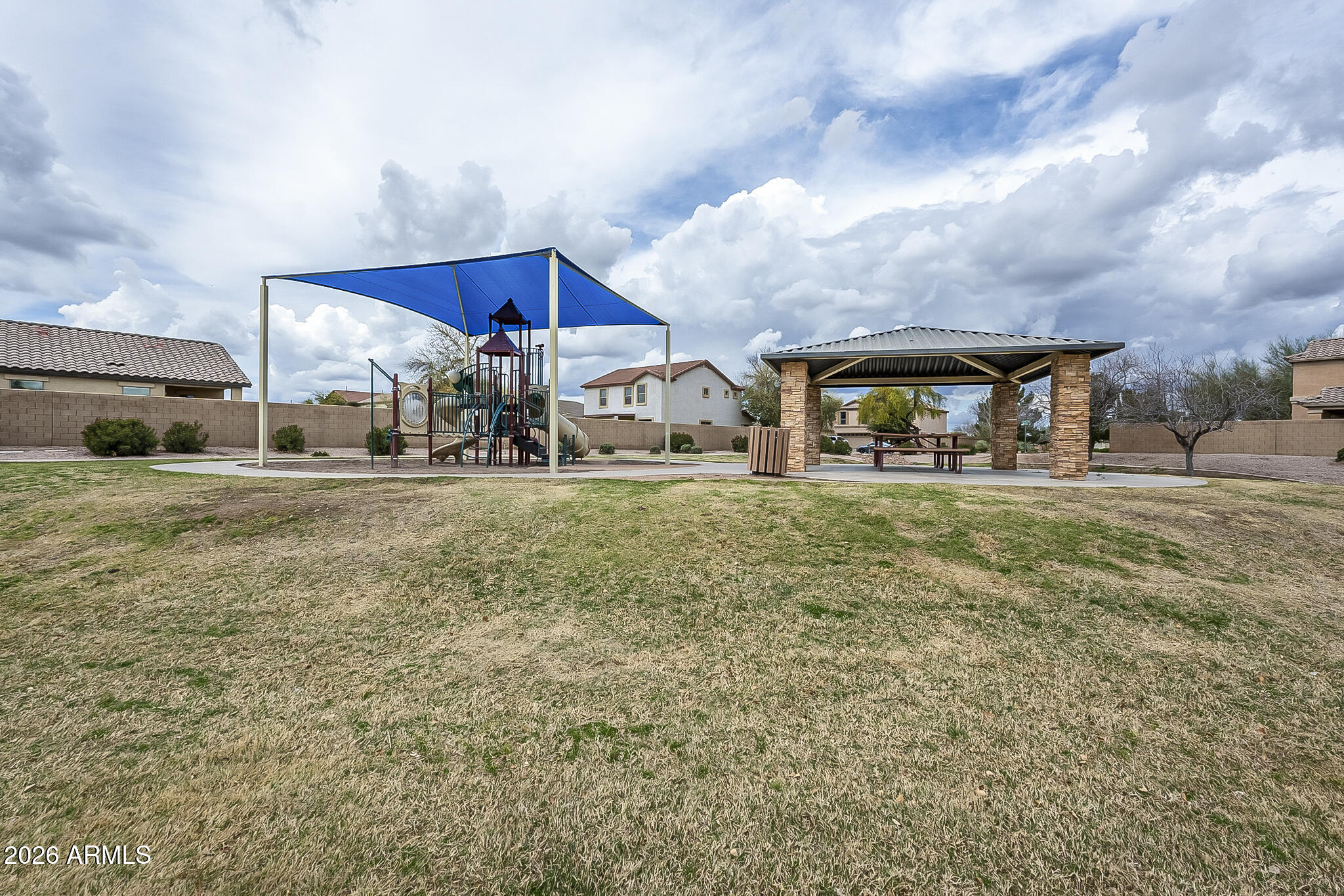 515 West Love Road San Tan Valley, AZ 85143 - Photo 36 of 74 a house view with a sitting space and garden view